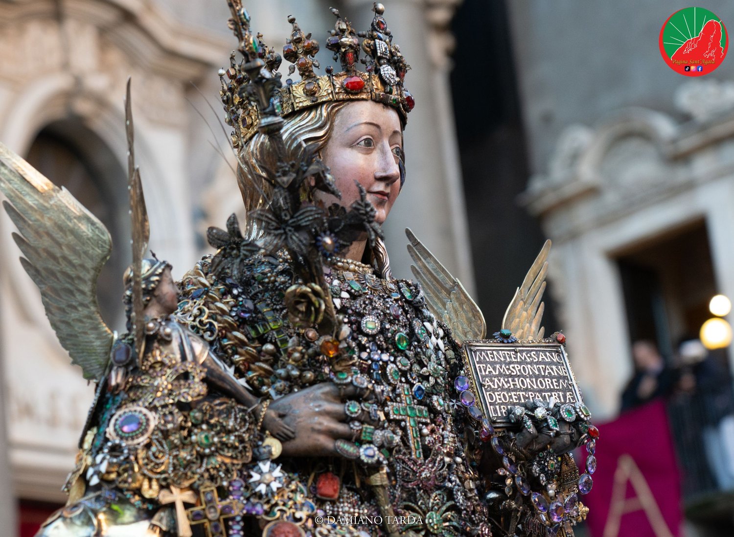 Detail of the reliquary bust of Saint Agatha with the crown and votive jewels.