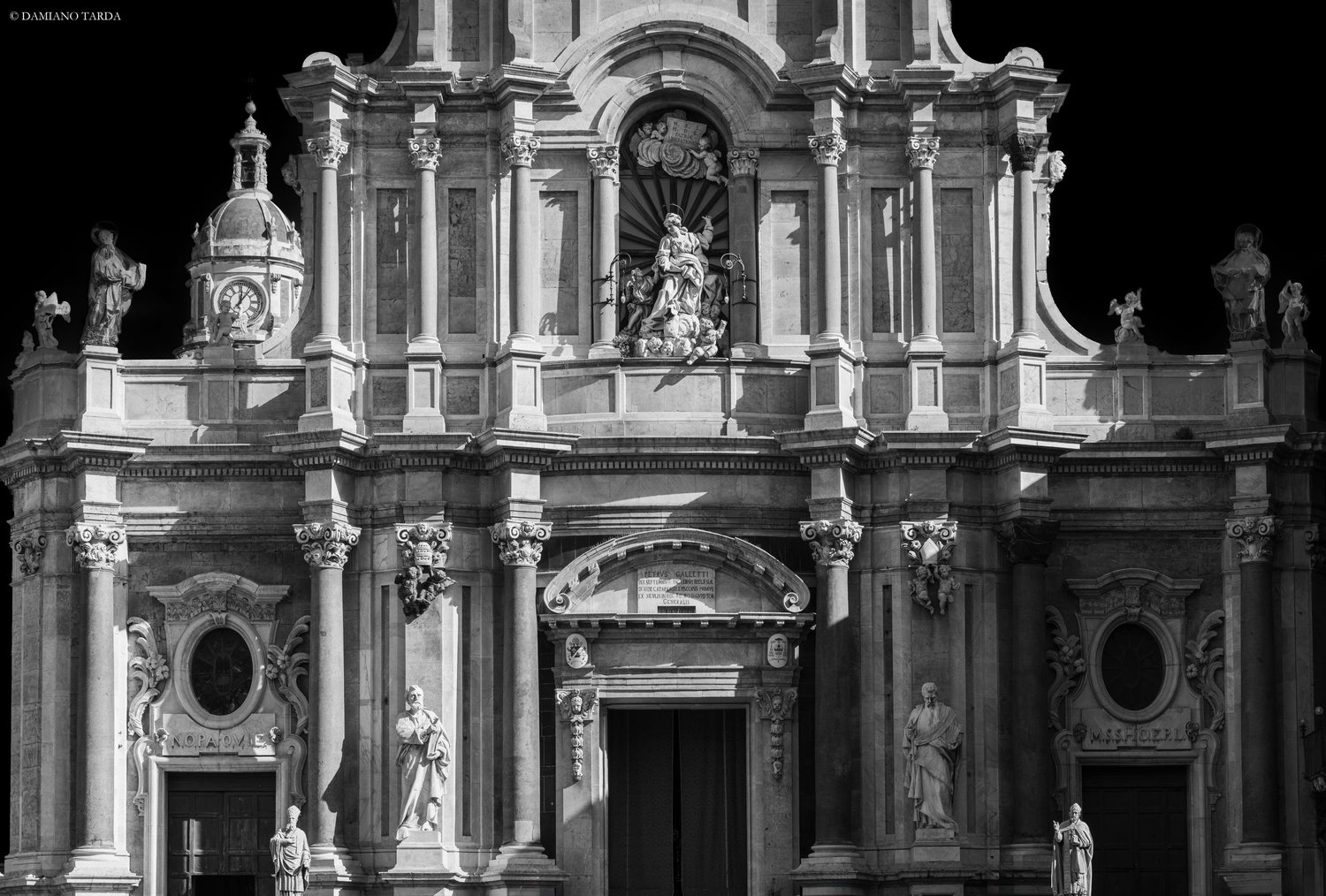 Late Baroque façade of Catania Cathedral, Sicily. Art and cultural heritage in black and white