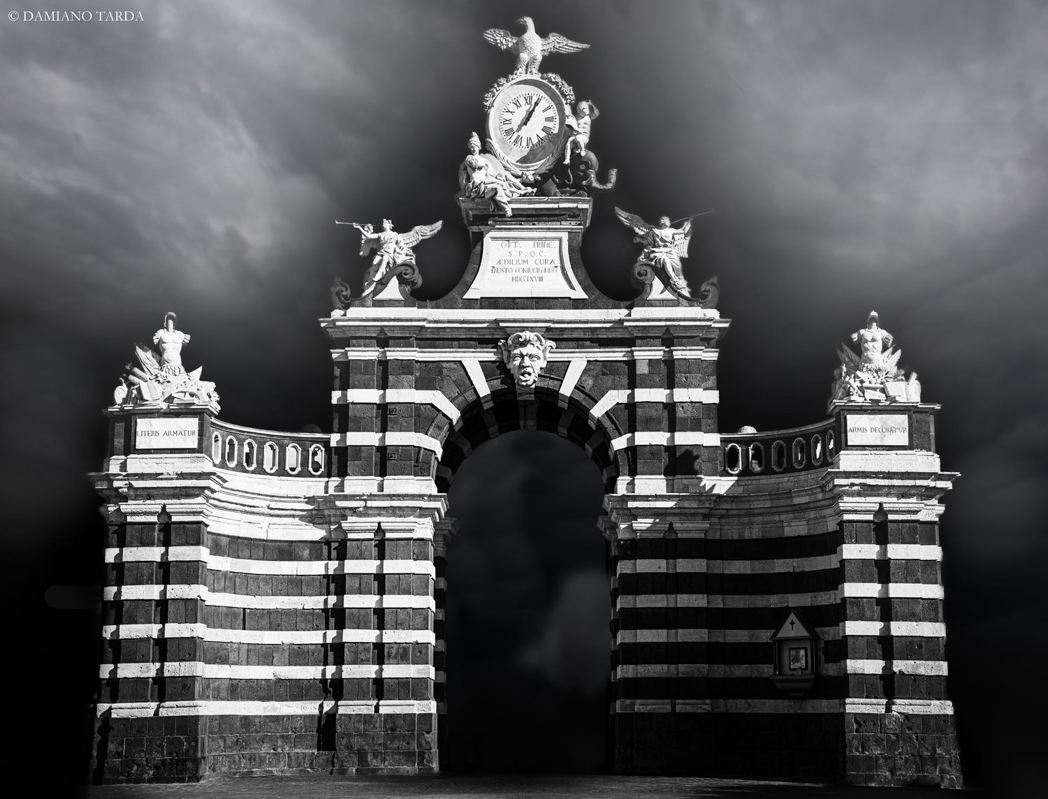 Artistic photograph of Porta Garibaldi in Catania, also called the "fortino", in black and white