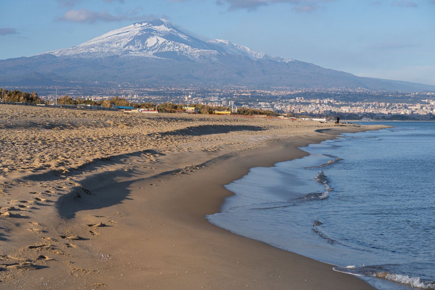 La Playa, Catania, a golden sand beach with Etna in the background, nature photography of eastern Sicily.