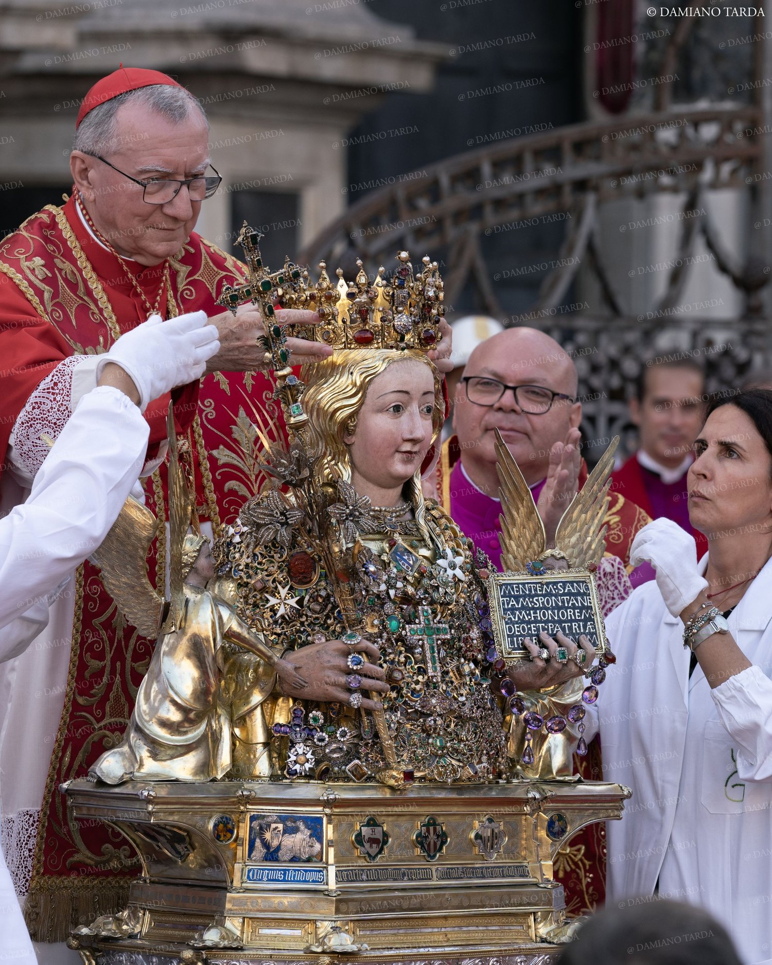 Prelates beside the reliquary bust of Saint Agatha during a celebration of the 900th anniversary in Catania.