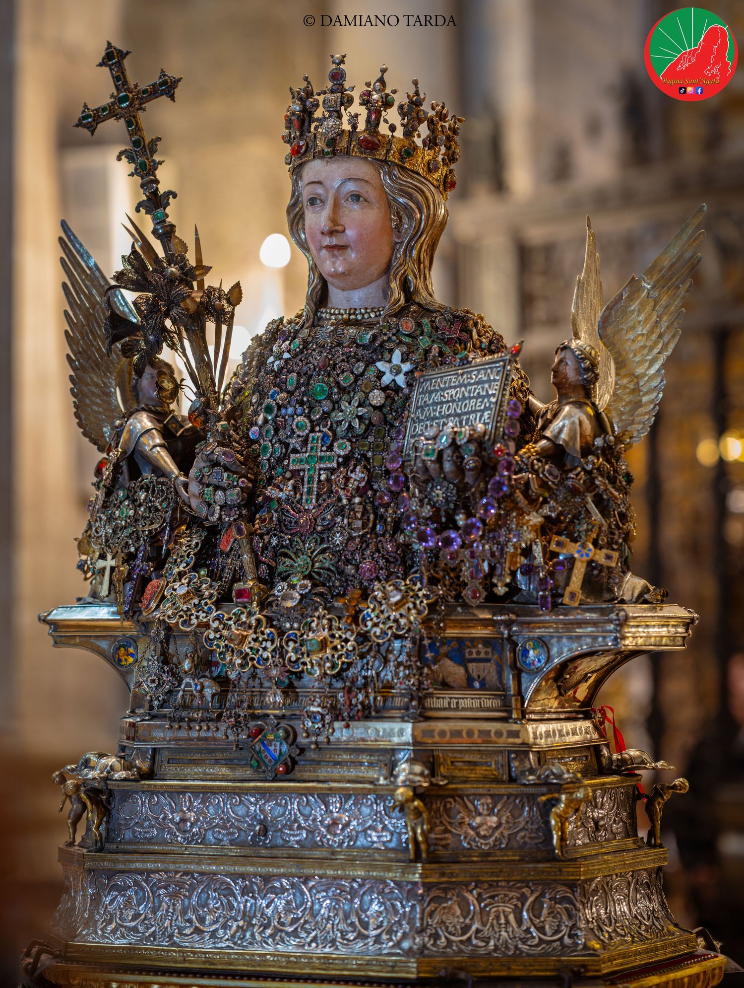 Close-up of the reliquary bust of Saint Agatha set with traditional jewels and precious ex-votos, Catania