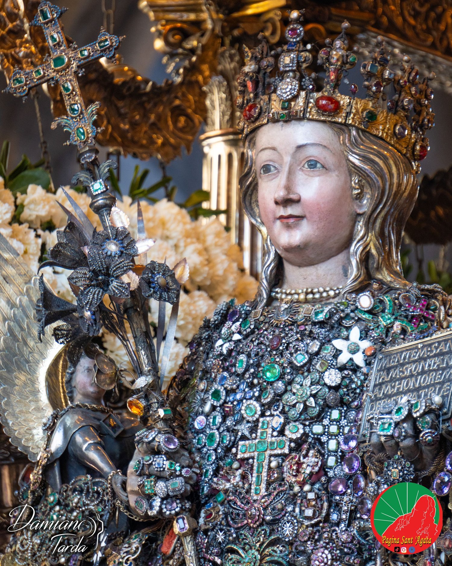 Close-up of the reliquary bust of Saint Agatha set with traditional jewels and precious ex-votos, Catania