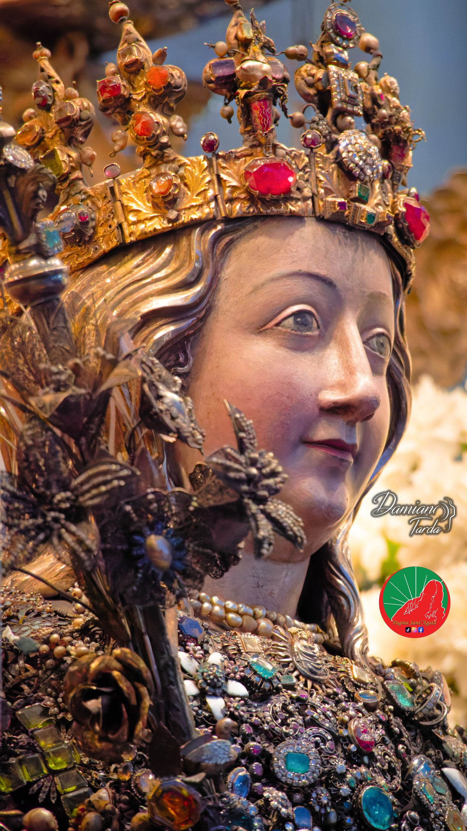 Close-up of the reliquary bust of Saint Agatha set with traditional jewels and precious ex-votos, Catania