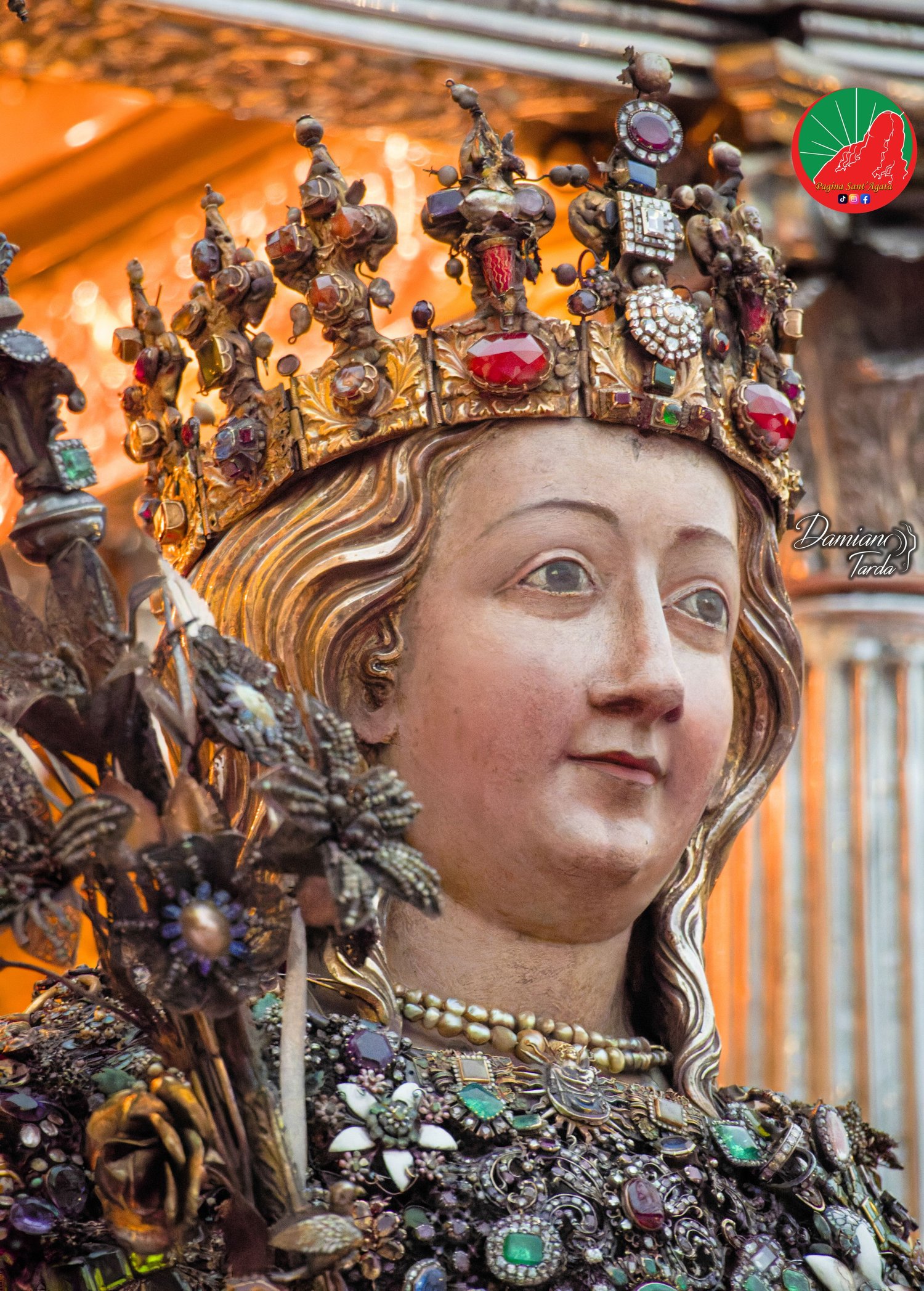 Close-up of the reliquary bust of Saint Agatha set with traditional jewels and precious ex-votos, Catania