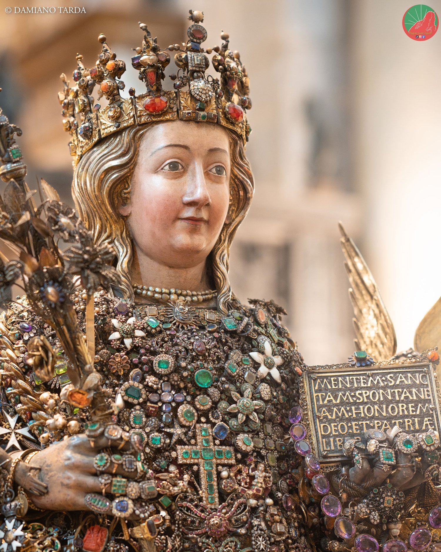 Close-up of the reliquary bust of Saint Agatha set with traditional jewels and precious ex-votos, Catania
