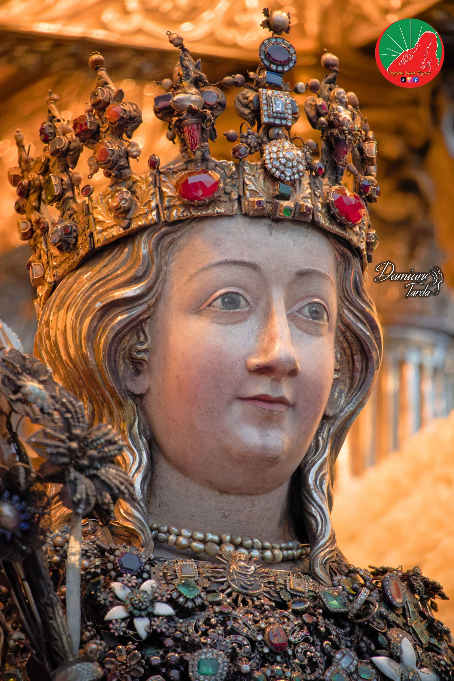 Close-up of the reliquary bust of Saint Agatha set with traditional jewels and precious ex-votos, Catania