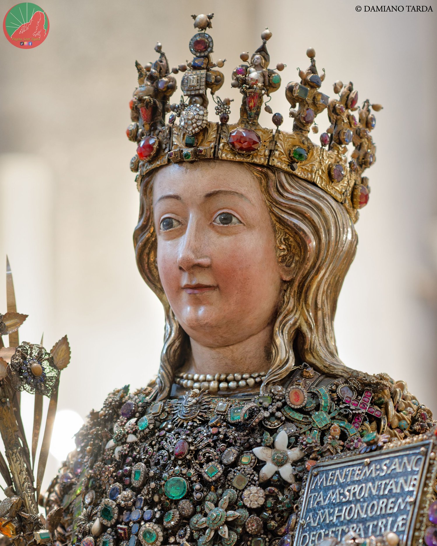 Close-up of the reliquary bust of Saint Agatha set with traditional jewels and precious ex-votos, Catania