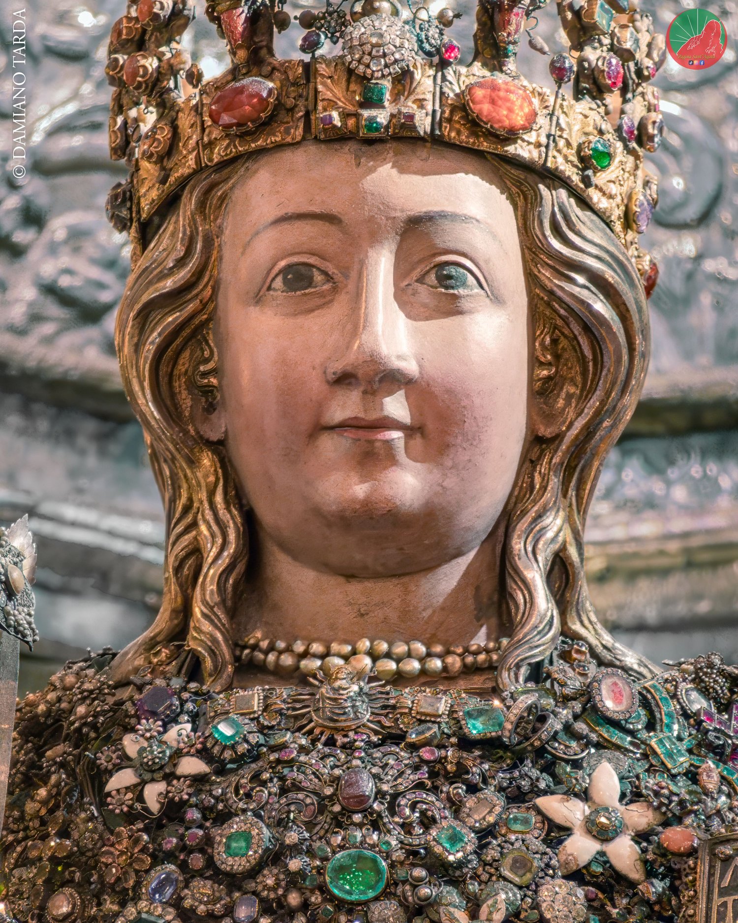 Close-up of the reliquary bust of Saint Agatha set with traditional jewels and precious ex-votos, Catania