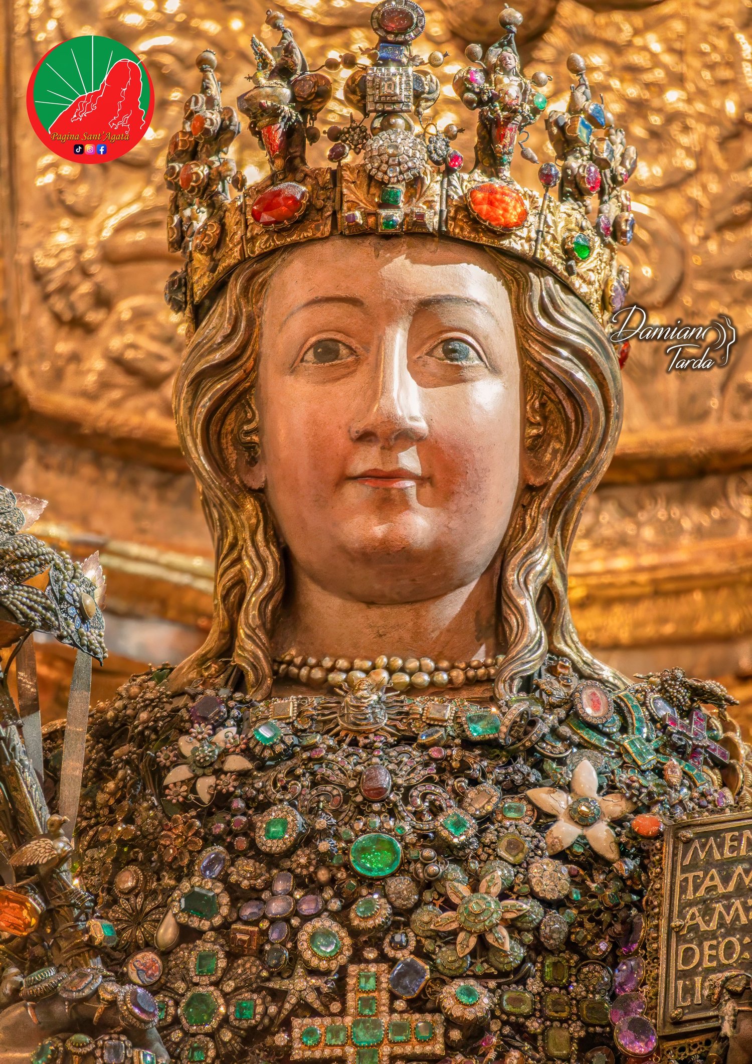 Close-up of the reliquary bust of Saint Agatha set with traditional jewels and precious ex-votos, Catania