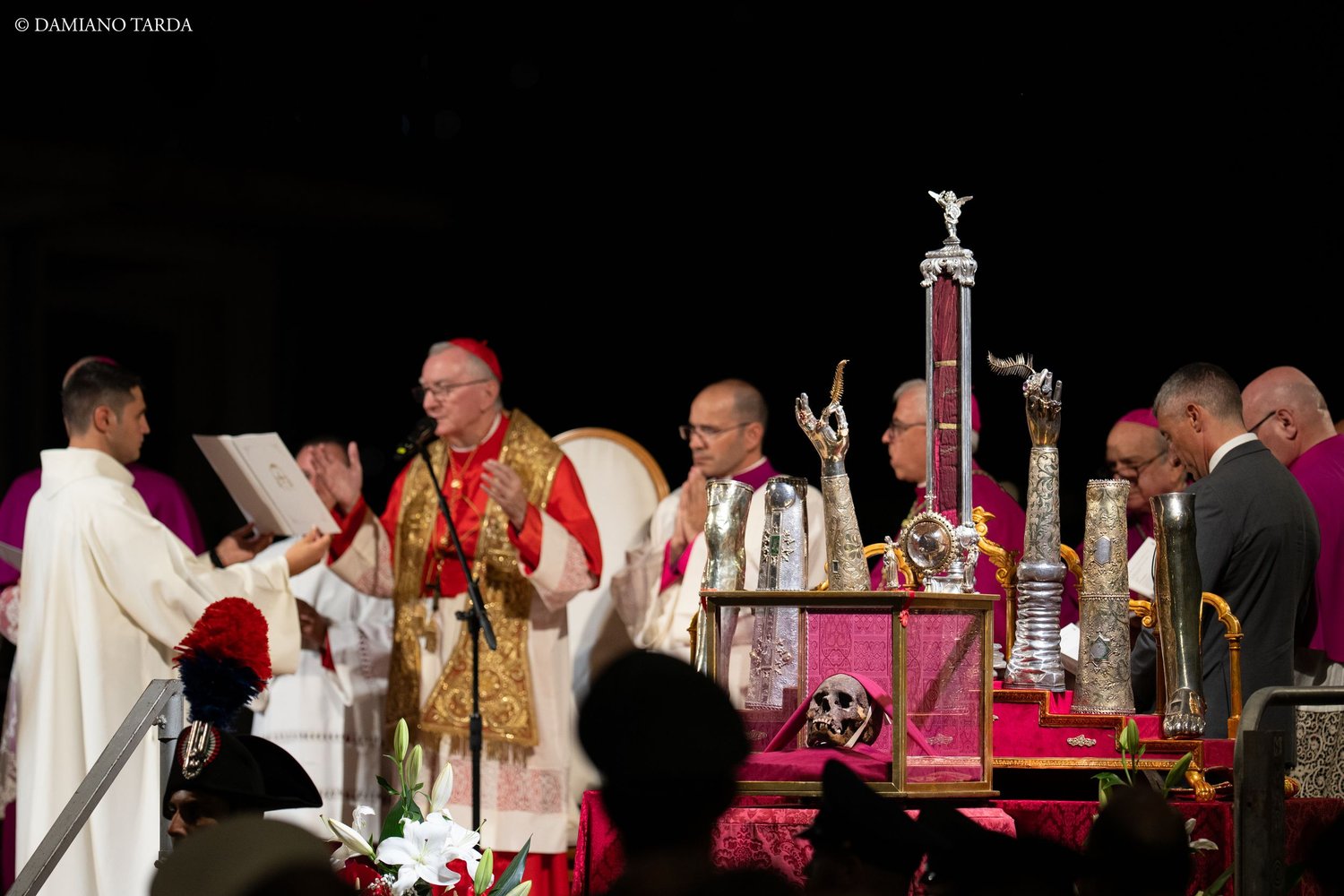 A prelate celebrates before the reliquaries of Saint Agatha during the night Mass of the 900th anniversary.